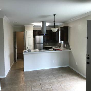 Photos by Grandstone Builders Inc #1 REMODEL TWO BATHROOMS AND REMOVE KITCHEN WALL TO HAVE A OPEN CONCEPT, REMODEL KITCHEN CABINETS WITH GRANITE COUNTE