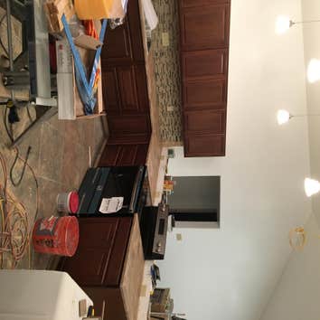Sims Foster Home New Kitchen Was asked to install a new Kitchen in a new construction. There were a total of 33 cabinets installed and a Custom Built C