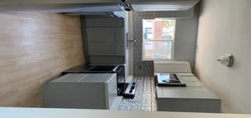 Photos by Head to Toe Home Improvement #2 The house only had a very tiny kitchen so we completely removed it and built a new specious kitchen with upda
