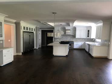 Photos by Nyvk #1 Custom build pearl white Inset kitchen cabinet with marble quartz counter top and marble back-splash