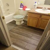 Photos by From the Ground Up #3 Removed ceramic tile from bathroom floor and installed vinyl planks.