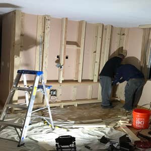 Photos by Prestige Costruction and Renovations Corp #1 40Lx 12H Block retaining wall
Entertainment system frame out
Tile work on outside retaining...
