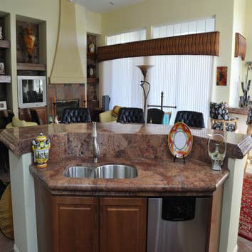 Kitchen countertops KItchen countertops, raised bar, and backsplash. Materials used are from Arizona tile: Juparana Florence Granite on countertops, ba