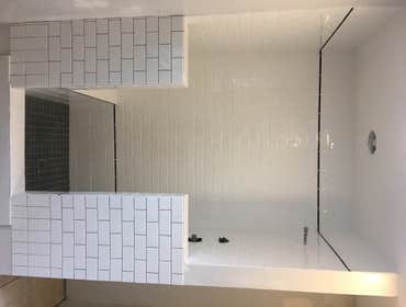 Walk in showers fully tiled