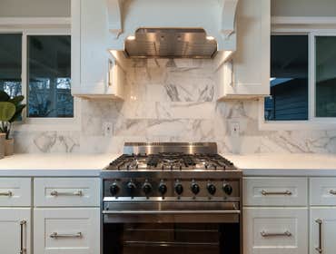 Chesterton Ave., Redwood City, CA The owners of this home favored a more traditional style for their complete remodel. In the kitchen, custom wood cabi