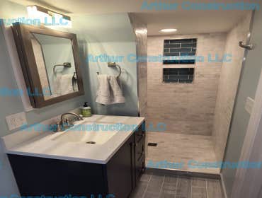 Photos by Arthur Construction, LLC #3 Build a new bathroom with marble tiling