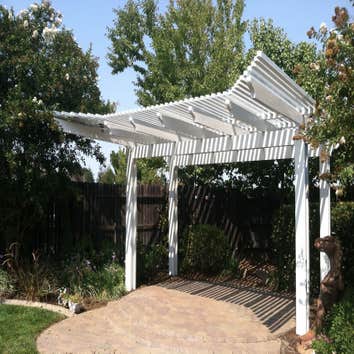 Duralum Patio Cover DURALUM performs like real wood can't and
unlike real wood, DURALUM shade structures
will not burn, attract termites, crack, peel