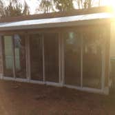 Photo(s) from Joe Hannock Custom Carpentry First is a glassed in room. The roof was existing. I framed the room, installed the doors, and trimmed the e