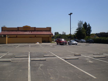 Denny's Seal Coat & Re-Apply Line Striping