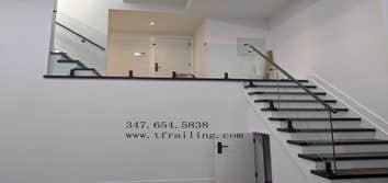 Photos by Tf Doors Inc #1 glass railing
