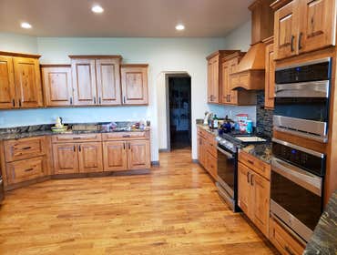 Photos by North Country Construction Inc #1 We built this gorgeous 5,000 SF house for a client in the powderhorn. It has a attached 3 car garage on a n