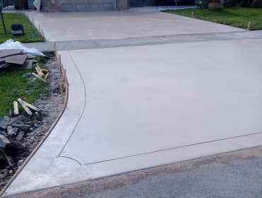 Photos by Stamped Concrete Denver LLC #1 Stamped concrete, often called textured or imprinted concrete, replicates the look of many different stones su