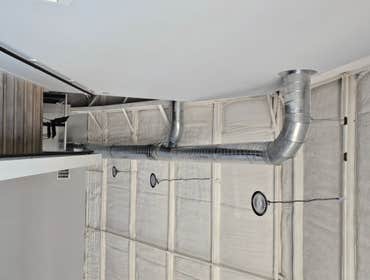 Photos by Kmi HVAC Mechanical INC #1 Commercial building remodel. Three Daikin package units and new round pipe duct work.