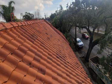 Photos by Gerdes Architectural Roofing, Spanish Tile / TPO Roof Replacement