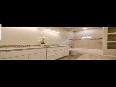 Photos by The American Dream Custom Home Builder #1 New custom built home. 3 bdrm 2 bathrm. Beautiful hard wood floors, custom cabinets and tile shower