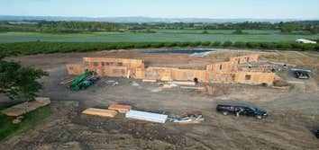 Photos by Aspire Homes Inc #3 Custom home with roof insulation, exterior insulation, solar, geothermal and pool.