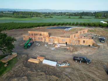 Photos by Aspire Homes Inc #3 Custom home with roof insulation, exterior insulation, solar, geothermal and pool.