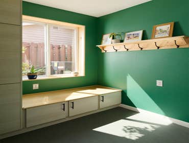 Garage to Flex Space Conversion In this project our clients had a 1960’s ranch style home with an attached original wood paneled garage with a visible 