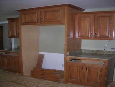 Kitchen Redesign from Inner Circle Concepts This simple kitchen renovation was designed to revamp its original showcased feel with new cabinets and gra