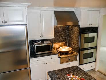 2000: Built-In Wok Kitchen A dedicated high BTU gas commercial grade built-in wok was the unique element that became the focal point for the majority o