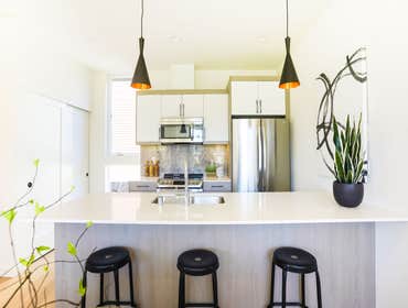 Subtle Toned and Airy Kitchen The subtly toned kitchen has Spark Hugo Oak flooring with a bright and spacious feel. Stainless steel kitchen appliances 