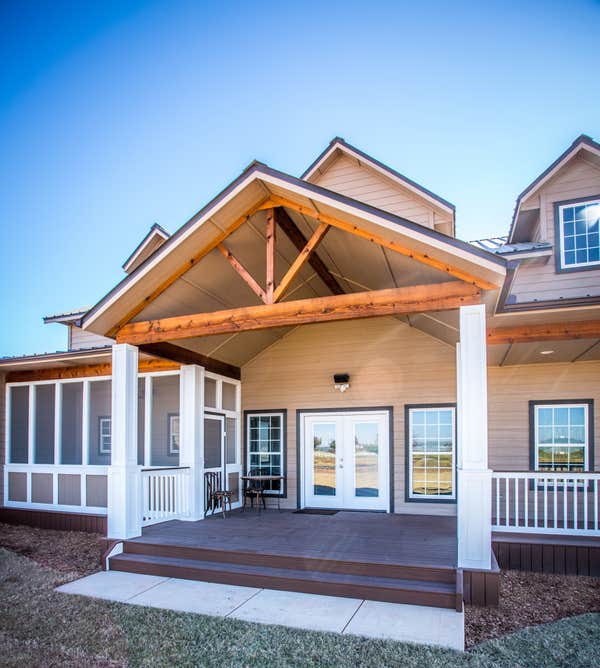 Ranch Road Ranch Road is a design that originated on an open rural site. Located west of Calumet, Oklahoma the site is situated next to a lake with a s