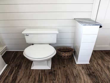 Baine Contracting Inc Project Multiple jobsites - showing kitchens, interior and exterior trim work, new homes, bathrooms, tile work, wood and iron ra