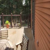 Photos by MiLLCraft Construction Co #1 20 x 30 Trex deck with stair rails and gates