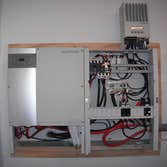 Project photos from Solar Wise Power Solutions Paradise Horse Ranch: 6kW Continuous AC, 2.8 kW DC, Off Grid, 900Ah@50VDC Battery Back-up , Lorentz Heli