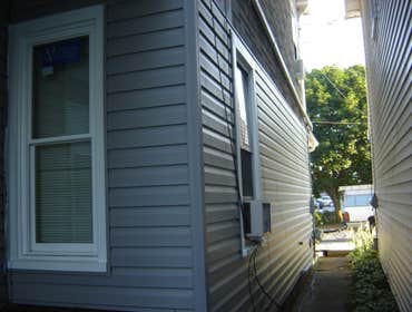 Swank Home Makeover A 2.5 story, single-family home: Siding, windows, insullation, soffit, fascia, capping. Also, repaired fence damage, installed new