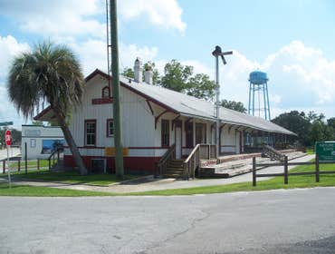 Train Depot Restoration Full exterior renovation: new roof, siding repair, decking, and handicap accessibility (ramp & parking)