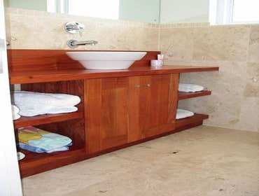 LAM Woodworks Here are some pictures of work done using different materials, from stained Mahogany to solid Bubinga or Beech, from Maple to Poplar for