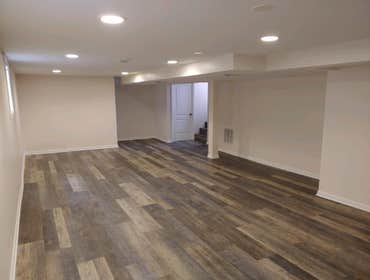 Basement by Best Fit Homes Inc Finishing a basement with adding a bedroom.