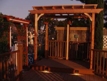 Custom Deck in San Diego, CA San Diego, California, One of the nicer decks I built with red-wood and TREX, with built-in low-voltage lighting looking o