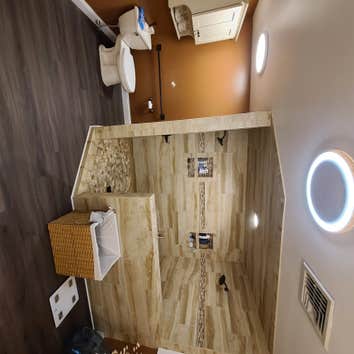 Tile shower/LVP install/ new Vanities/ toilet/ paint (antique copper) by BEHR