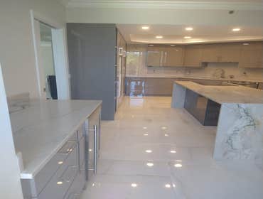Photos by Bayside Home Improvement Inc #3 In this project we completly remodeled the kitchen with new cabinets, countertops, backsplash, floors, lights