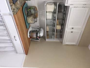 Custom open kitchen shelving w/ butcher block top