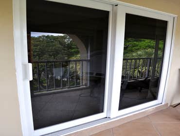 Tierra Del Mar Condo - Installation Removed non-impact sliding glass door and replaced with impact sliding glass door.