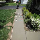 Service Walk remove old concrete and replace