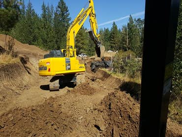 Underground home addition This was a great project! It started as digging out for 2 36'x36' additions on a underground house. ended up excavating and b