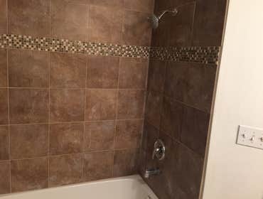 Bathroom Remodel Feb 2016 Removed old tub and tub surround. Installed new tub, plumbing, backer boards, waterproofing barrier, insulation. New design