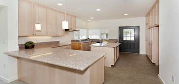 Restore Neighborhoods LA Dreyfuss Construction built 12 new construction single family homes for RNLA. The for sale homes were designed and built for