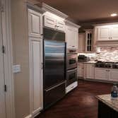 R Project Whole house remodel with a large kitchen remodel that required structural changes. Finished flooring, cabinets, countertops, relocation of 