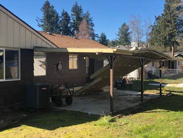 Photos by Dudley Const & Remodel LLC #1 Snow collapsed old awning on the back porch. Built brand new awning with clear, corrugated, plastic and new gut