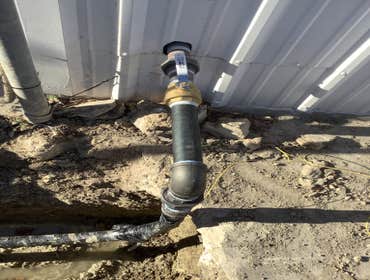 Gas Line Installation in Dallas Texas, entering building