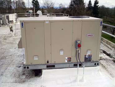 American Standard installation residential This is a recent installation of an American Standard heating and cooling system in a residential setting.