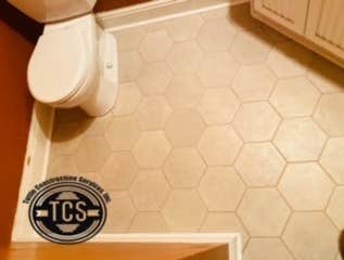 Photos by Tuttle Construction Services Inc #5 Install new tile floor in bathroom.