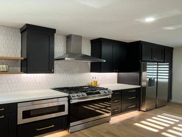 Photos by Prime Builders & Experts Inc #2 Kitchen complete Remodel with modern farm look of black shaker cabinets and gold finishes