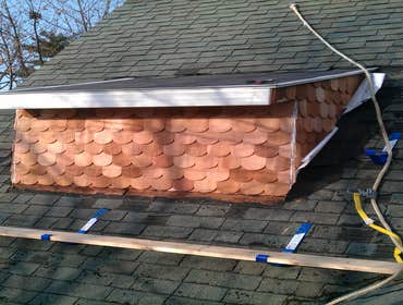 Kauffman Property Services Project 3rd floor dormers installed