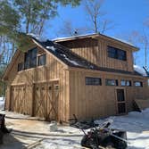 Barn shop Workshop with upper studio. Note custom doors